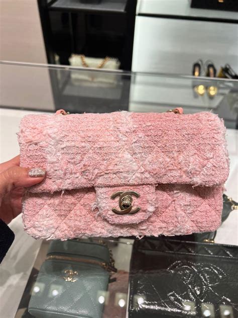 chanel pink tweed handbag.